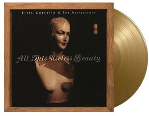 Costello, Elvis & the Attractions: All This Useless Beauty - Limited 180-Gram Gold Colored Vinyl (Vinyl LP)